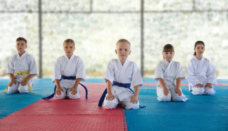 Children in kimono sitting on tatami