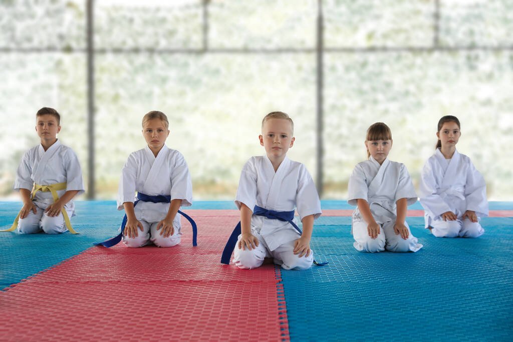 Children in kimono sitting on tatami